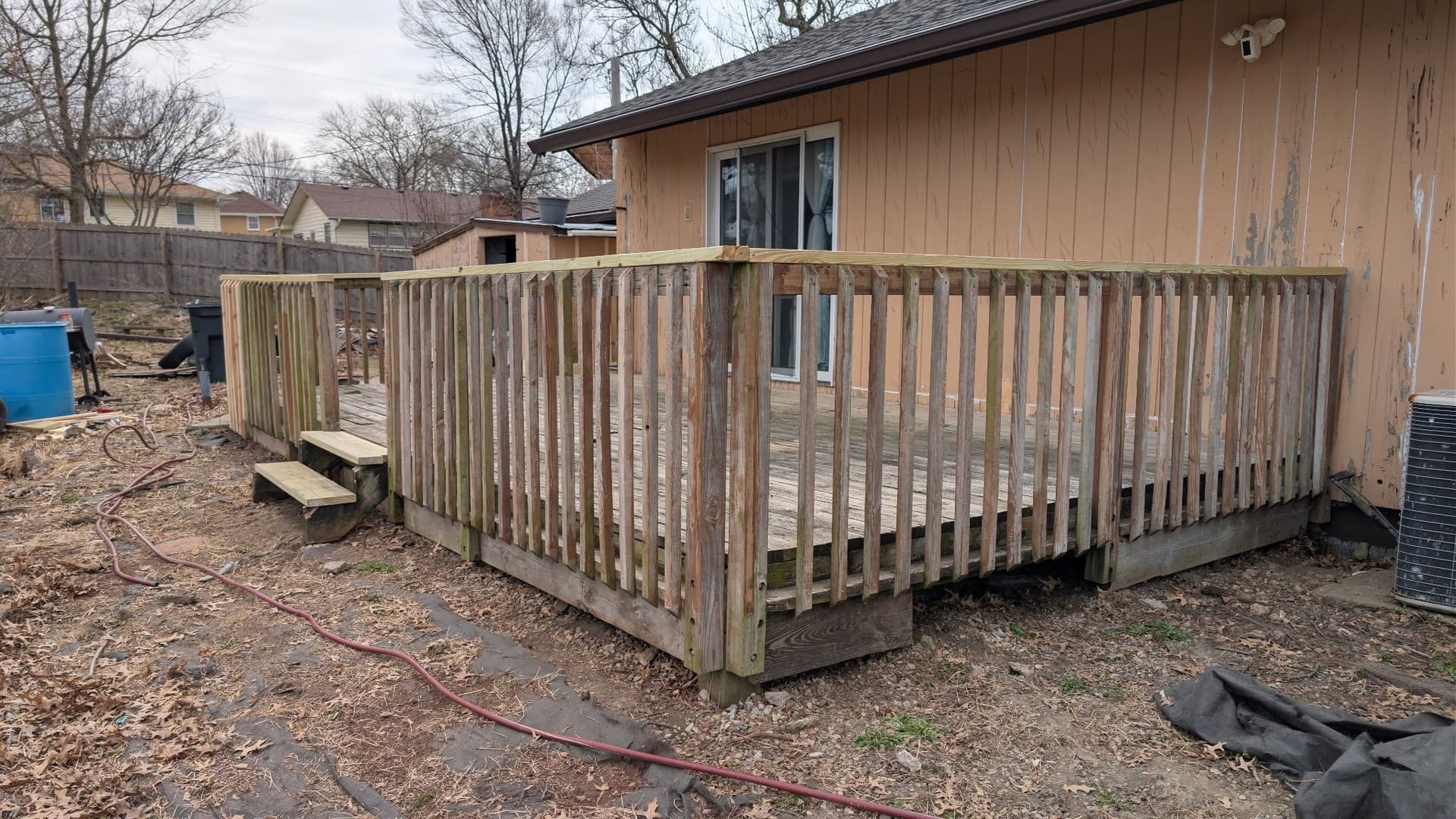 Gallery photos for Worn Out Deck Gets New Railings, Boards, and a Fresh Stain: Image #1