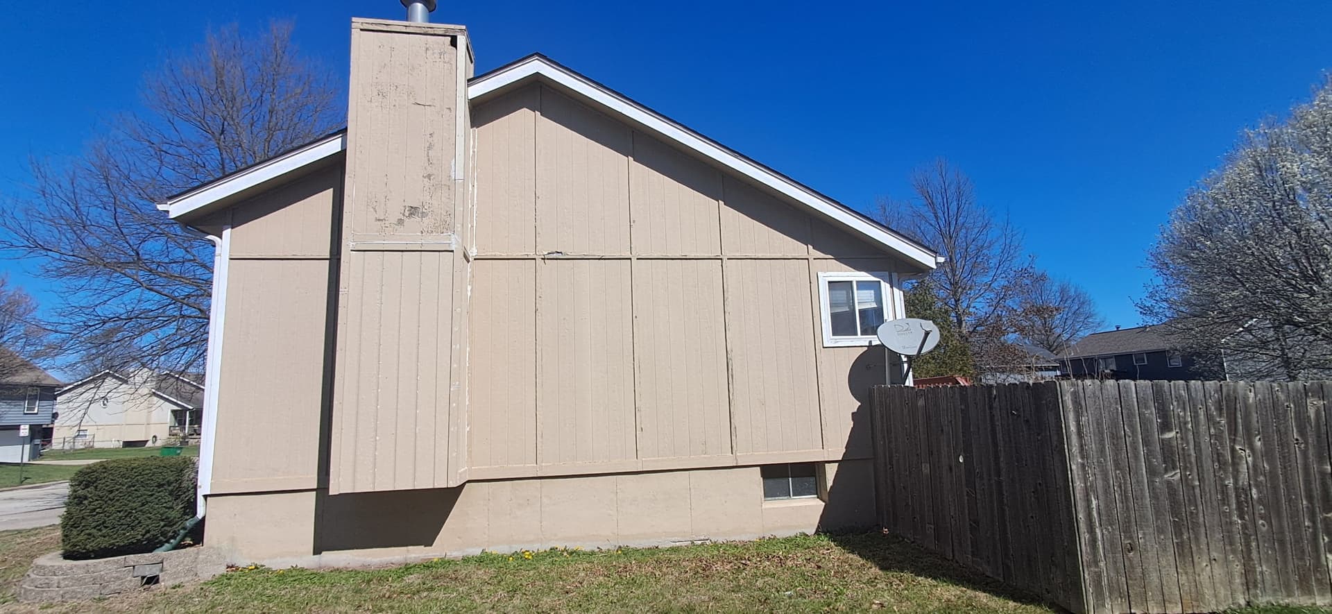 Faded Exterior Siding Gets a Bold New Color image