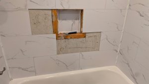 Gallery photos for Closing Up a Built-In Shelf for a Cleaner Bathroom Wall: Image #1